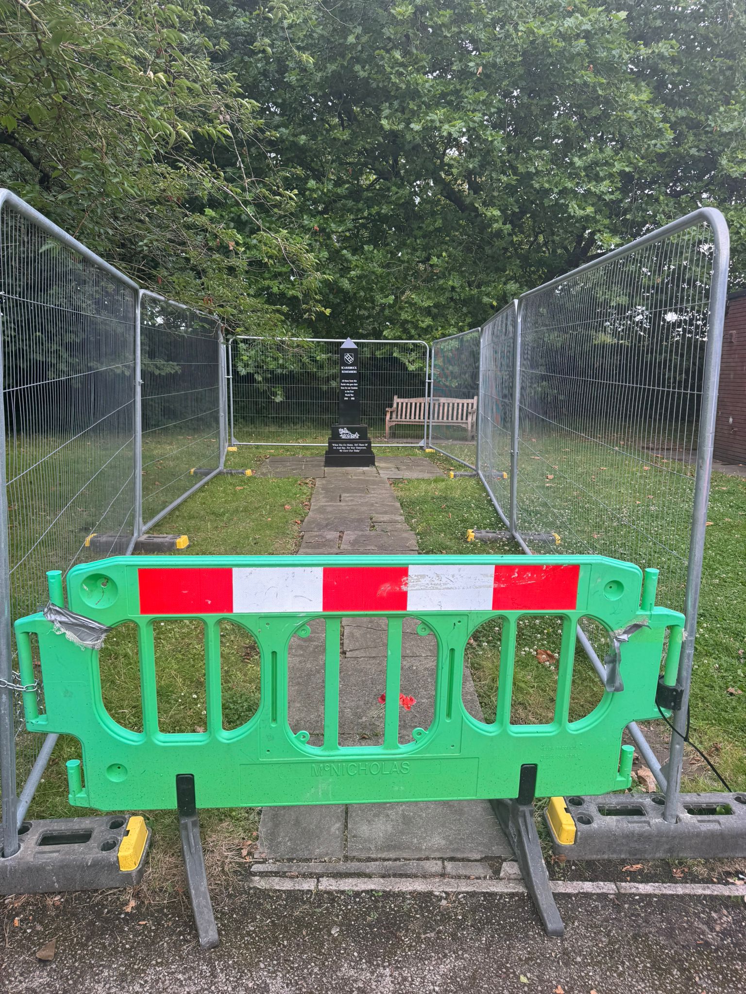 The war memorial at Scarisbrick Village Hall, fenced off from the public