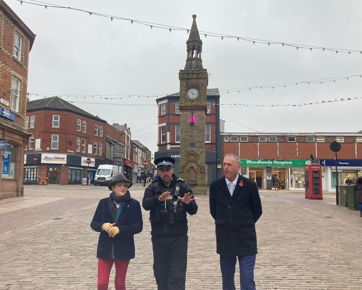 Ashley with Lancashire's Police and Crime Commissioner and a member of Lancashire Police in Ormskirk town centre
