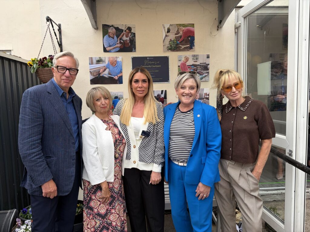 Ashley with Marian's family and Home Manager Laura.